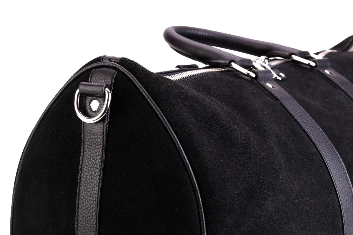 FITZROVIA suede leather weekender bag handle and attachment detail