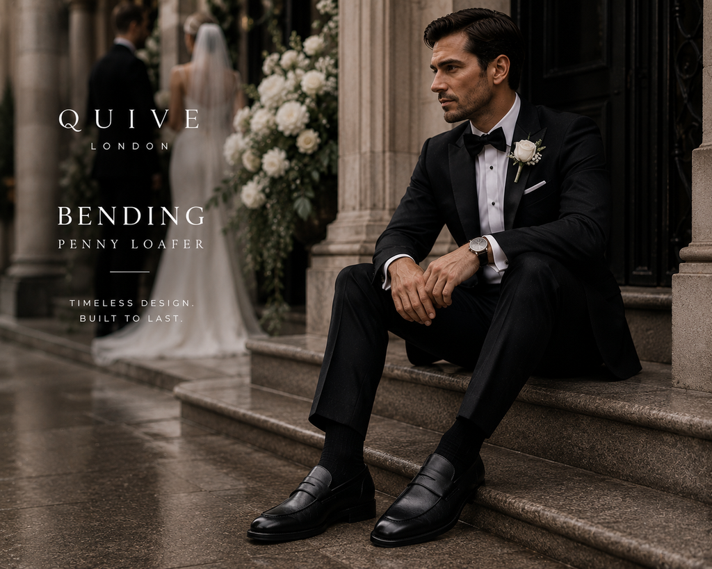 Man wearing QUIVE London Bending black leather penny loafers