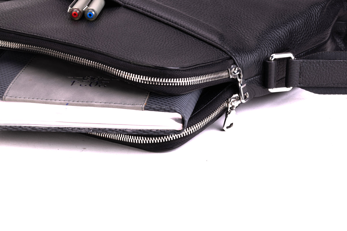 PORTMAN black leather crossbody bag open zip compartment and storage detail