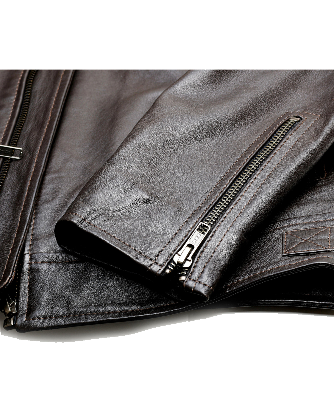 BROMPTON brown sheepskin leather jacket close-up showing the zipped cuff, stitching and natural full-grain texture
