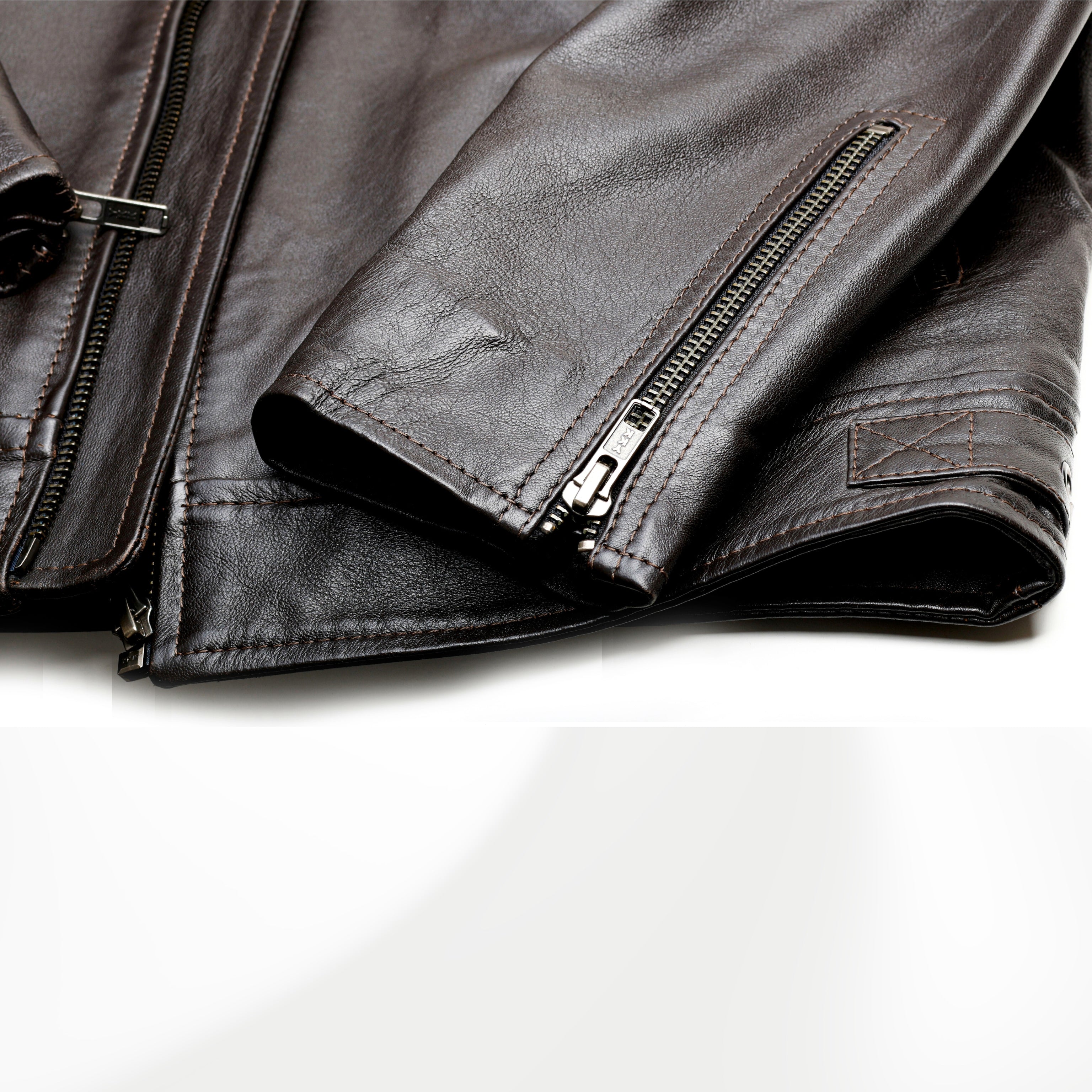BROMPTON brown leather jacket zipped cuff detail