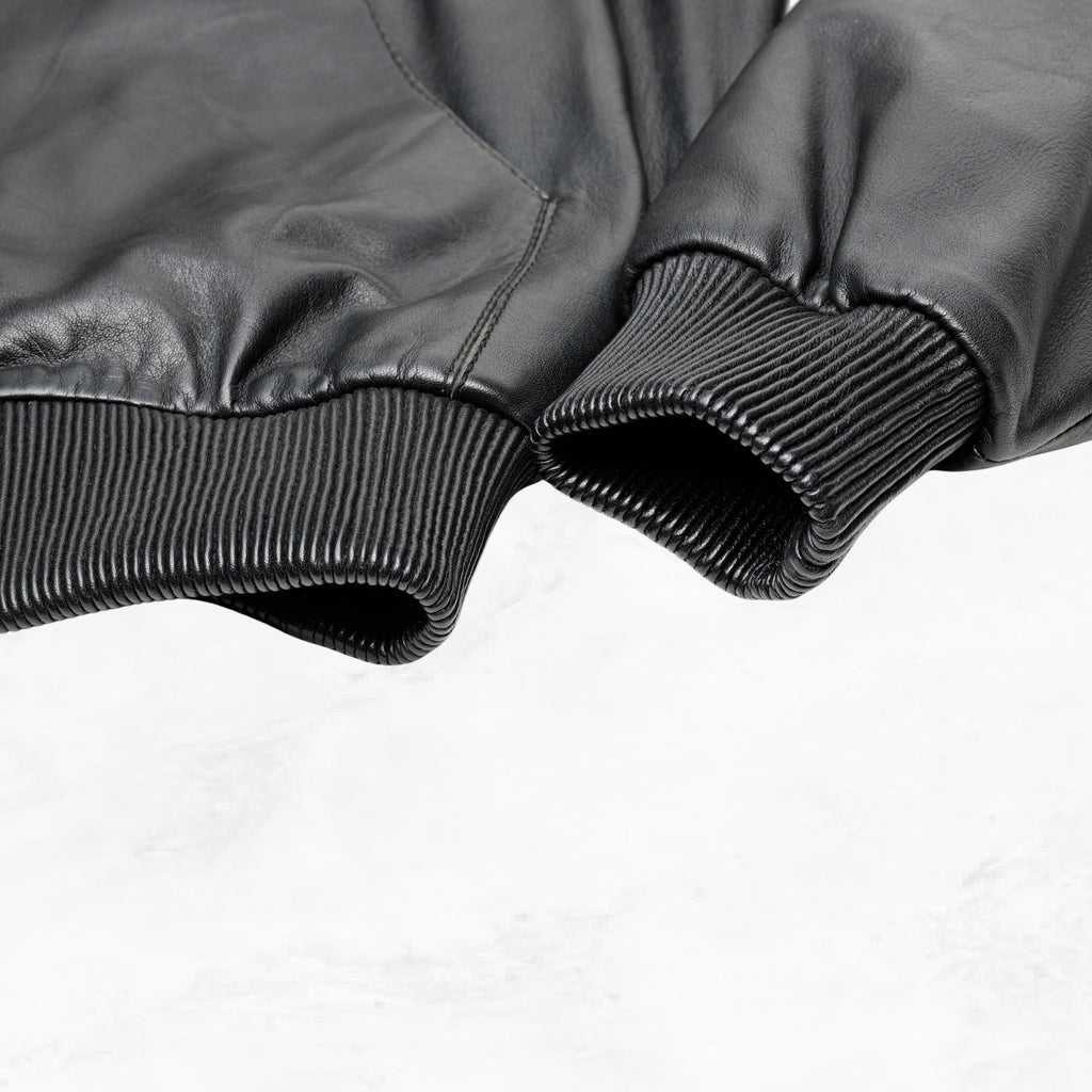 KNIGHTSBRIDGE black leather jacket ribbed cuff detail