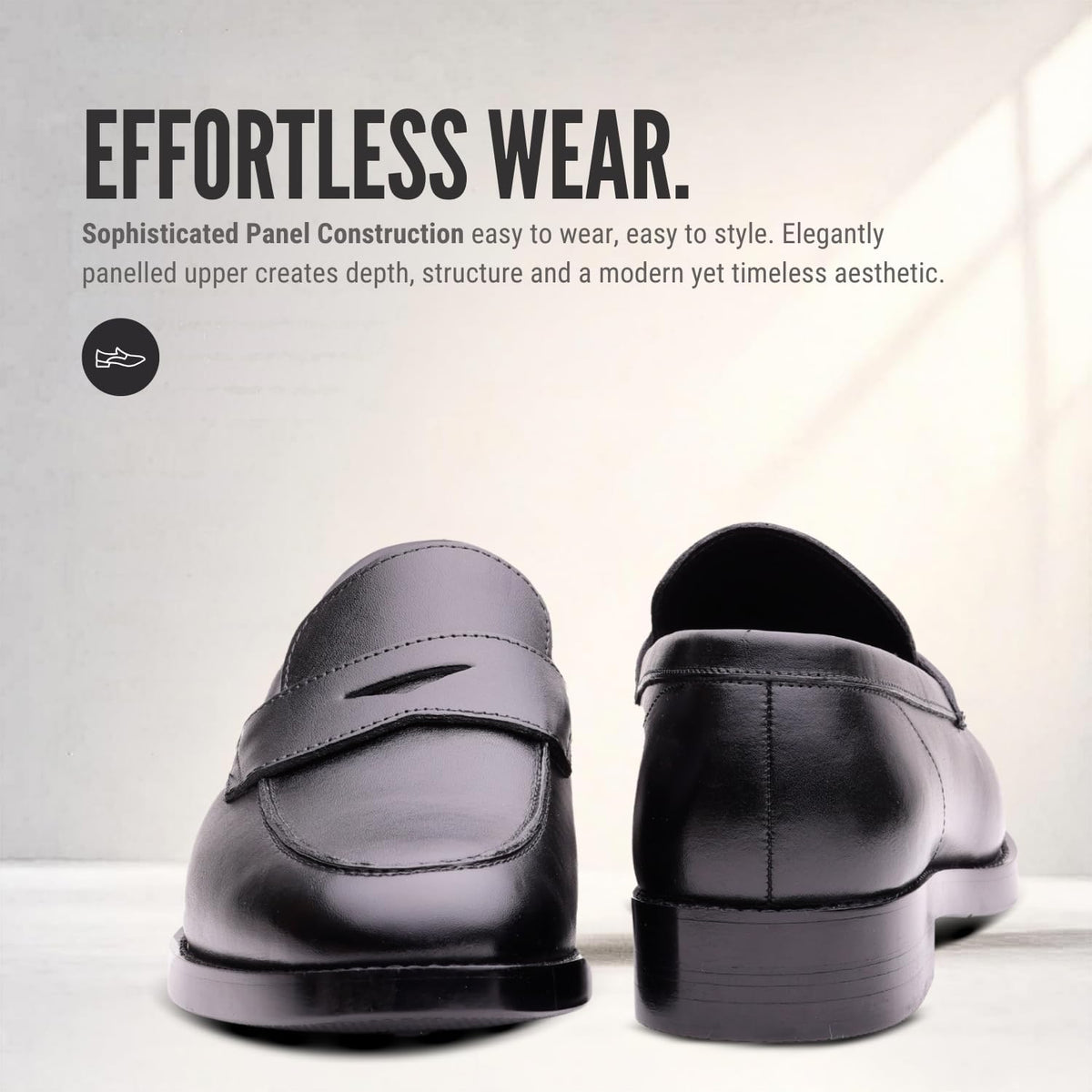 Front and rear views of REGENT black leather penny loafers