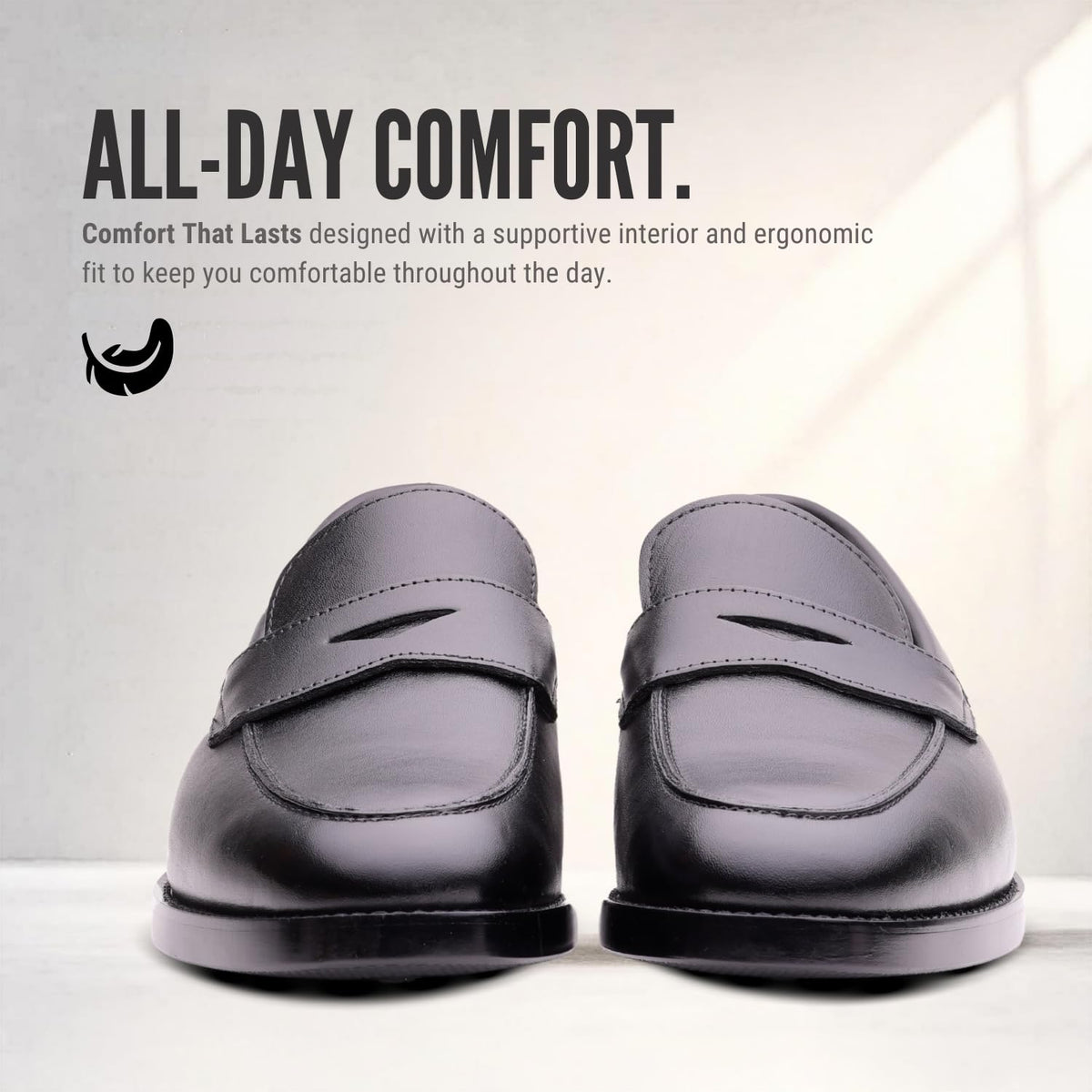 Front view of REGENT black leather penny loafers
