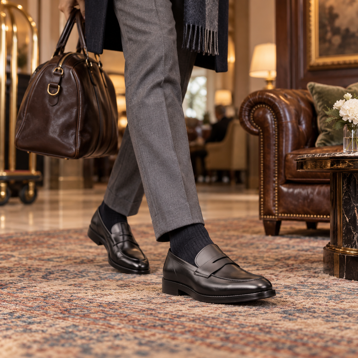 REGENT black leather penny loafers styled in a lounge