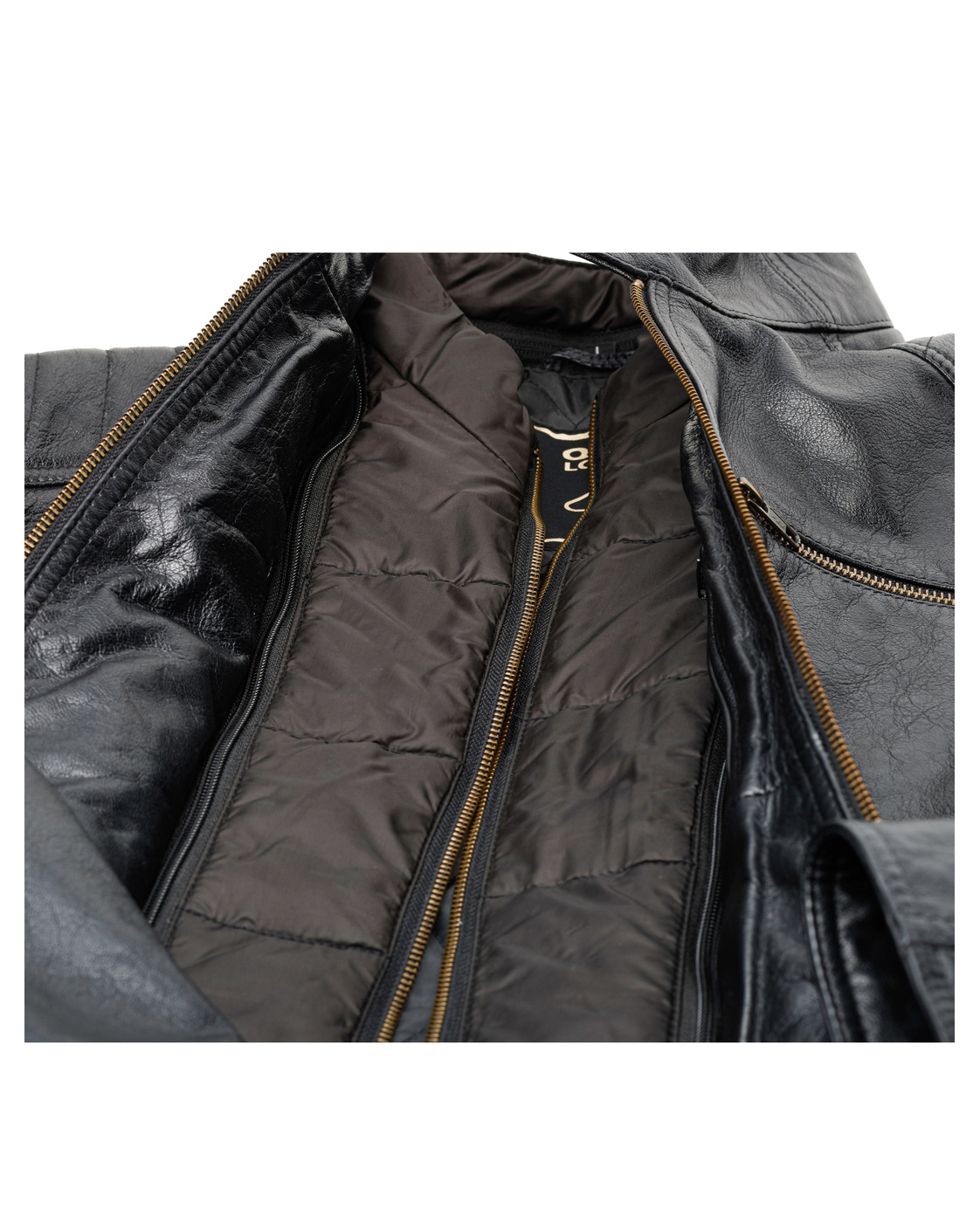 TRAPPER black leather jacket open detail on pure white, showing the removable quilted liner and layered two-zip construction